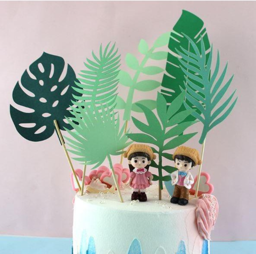Tropical leaf sugar decorations: dinosaur theme cake decoration